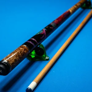 Full length Phoenix custom pool cue by Kaine Cues on a clean background.